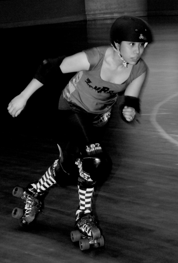 Senorita GonnaEatYa Roller Derby Skater Action Shot