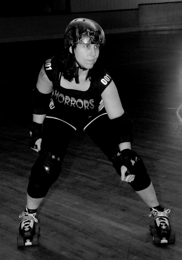 Whiskey Lullabye Roller Derby Skater Action Shot Whiskey Lullabye Roller Derby Skater Action Shot